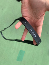 将图片加载到图库查看器,Close-up of black P-band resistance band showing exercise guide text - 25-65lbs workout loop band
